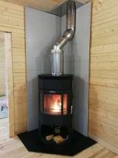 Недорогой камин с отделкой шамотом Сибирь 12 фото в интерьере в Борисове