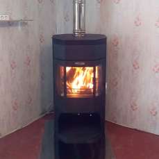 Недорогой камин с отделкой шамотом Сибирь 12 фото в интерьере в Борисове