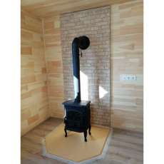 Чугунный камин со стеклом Сибирь 7 фото в интерьере в Борисове