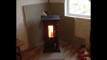 Отопительная печь Термофор Статика Тетра, чёрная бронза фото в интерьере в Борисове