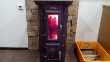 Стальная печь Термофор Статика Тетра, чёрная бронза фото в интерьере в Борисове