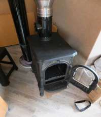 Недорогой печь-камин со стеклом Сибирь 6 фото в интерьере в Борисове