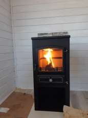 Стальной печь-камин со стеклом ЭТНА (БКД) с плитой фото в Борисове