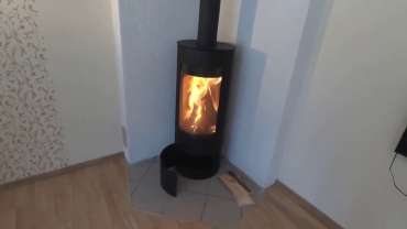 Стильная печь-камин с шамотом Мета-Бел Селигер в Борисове фото в интерьере в Борисове