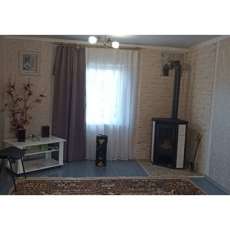 Стальной камин с шамотом Мета-Бел Ритм L фото в интерьере в Борисове