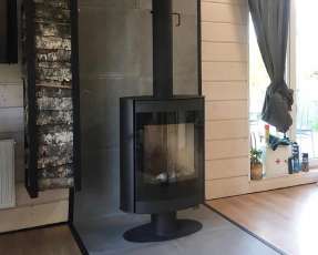 Печь-камин с теплообменником Мета-Бел АОТ 7.0-01 Свитязь фото в интерьере в Борисове