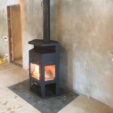 Купить недорогой камин с шамотом Мета-Бел Енисей в Борисове фото в интерьере в Борисове