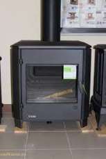 Печь-камин чугунный Invicta Carolo в интерьере Амазонка бай фото  в Борисове