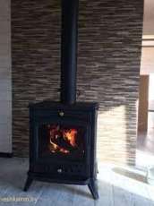 Печь-камин чугунный Invicta Altea в интерьере Амазонка бай фото в Борисове