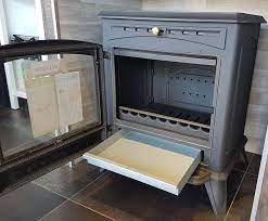 Печь-камин чугунный Invicta Altea в интерьере Амазонка бай фото в Борисове