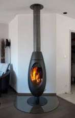 Печь-камин чугунный Invicta Ove в интерьере Амазонка бай фото в Борисове