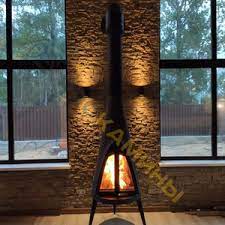 Печь-камин чугунный Invicta Pow-Wow в интерьере Амазонка бай фото в Борисове